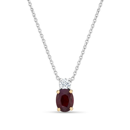 Oval Cut Ruby and Diamond Pendant in White and Yellow Gold