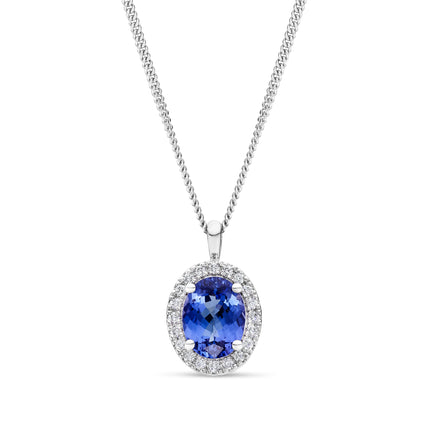 Oval Cut Tanzanite and Diamond Halo Pendant in White Gold