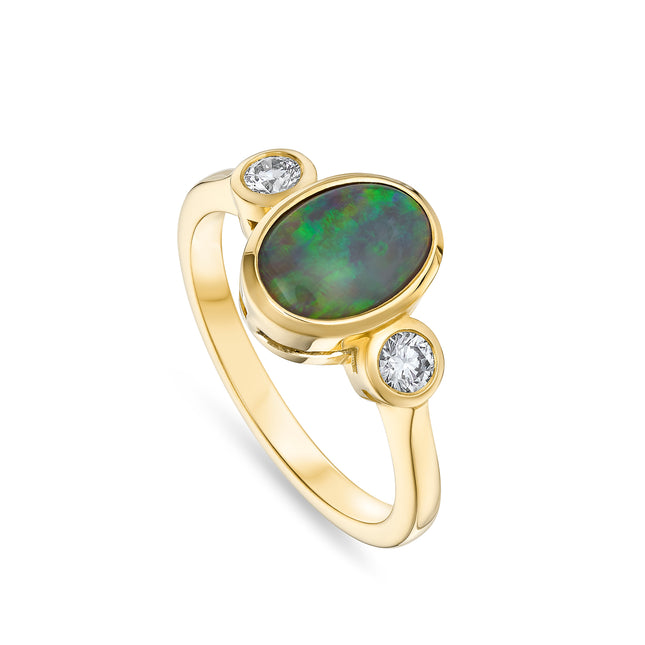Oval Black Opal and Diamond Trilogy Ring in Yellow Gold