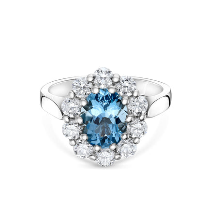 Oval Cut Aquamarine and Diamond Cluster Ring in Platinum