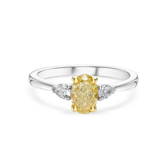 Oval Cut Yellow Diamond Trilogy Ring in Platinum and Yellow Gold