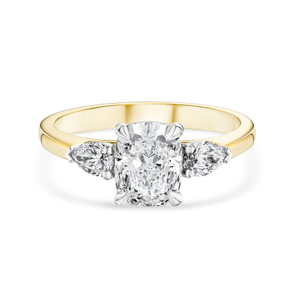 Cushion Cut Diamond Trilogy Ring in Yellow Gold and Platinum