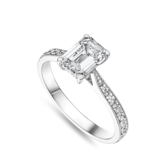 Emerald Cut Diamond Ring with Side Stones in Platinum