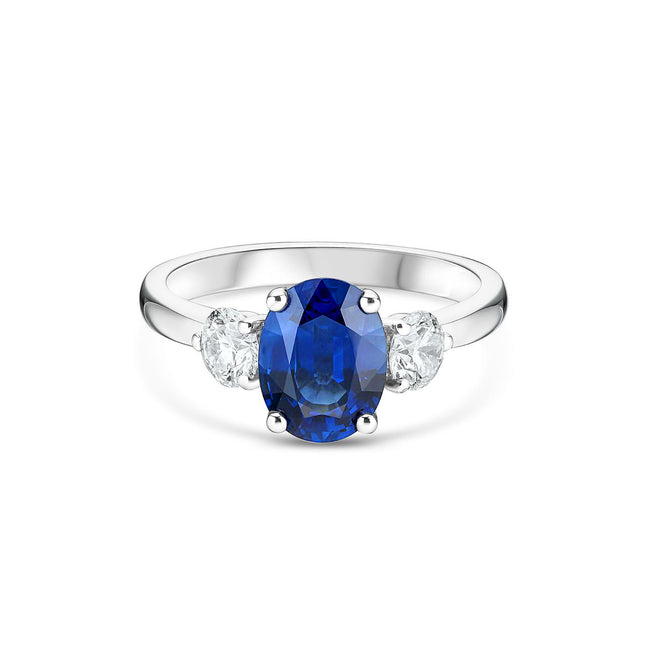 Oval Cut Sapphire and Diamond Trilogy Ring in Platinum