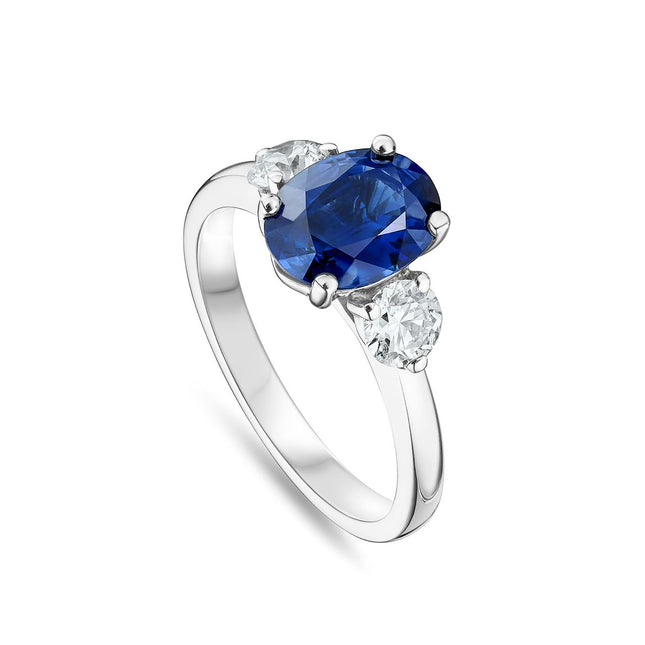 Oval Cut Sapphire and Diamond Trilogy Ring in Platinum
