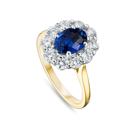 Oval Cut Sapphire and Diamond Cluster Ring in Yellow Gold and Platinum