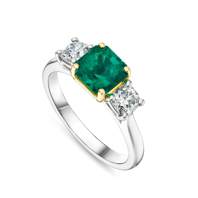 1.41ct Emerald Cut Emerald and Diamond Trilogy Ring in Platinum and Yellow Gold