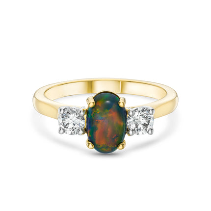 Oval Cut Black Opal Trilogy Ring in Yellow Gold and Platinum