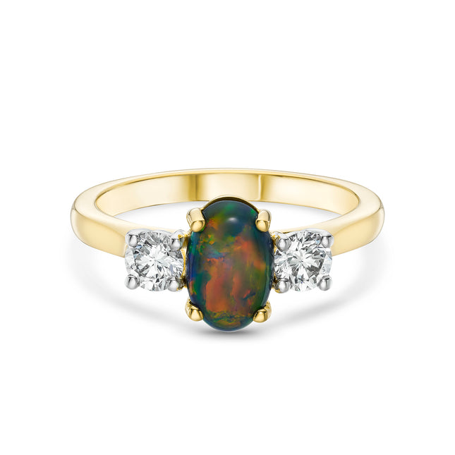 Oval Cut Black Opal Trilogy Ring in Yellow Gold and Platinum