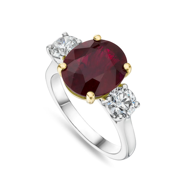 5.05ct Oval Cut Ruby and Diamond Trilogy Ring in Platinum and Yellow Gold