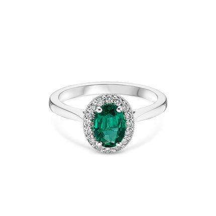 Oval Cut Emerald Halo Ring in Platinum