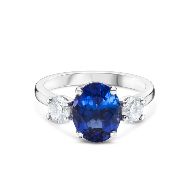 Oval Cut Tanzanite and Diamond Trilogy Ring in Platinum