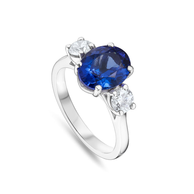 Oval Cut Tanzanite and Diamond Trilogy Ring in Platinum