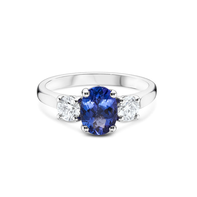 Oval Cut Tanzanite and Diamond Trilogy Ring in Platinum