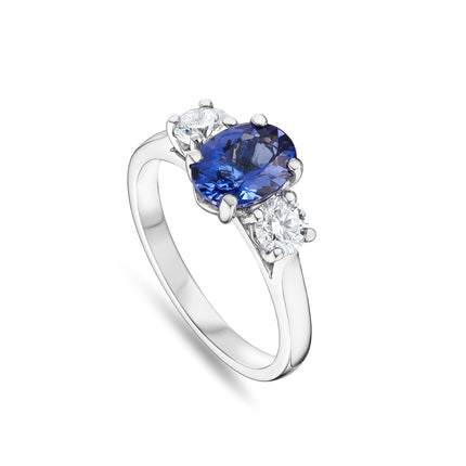 Oval Cut Tanzanite and Diamond Trilogy Ring in Platinum