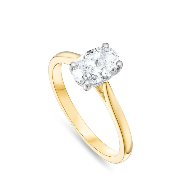 Oval Cut Diamond Solitaire Ring in Yellow Gold and Platinum