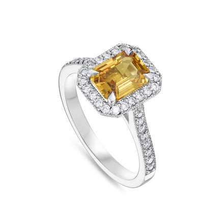 Emerald Cut Yellow Sapphire and Diamond Halo Ring in Platinum