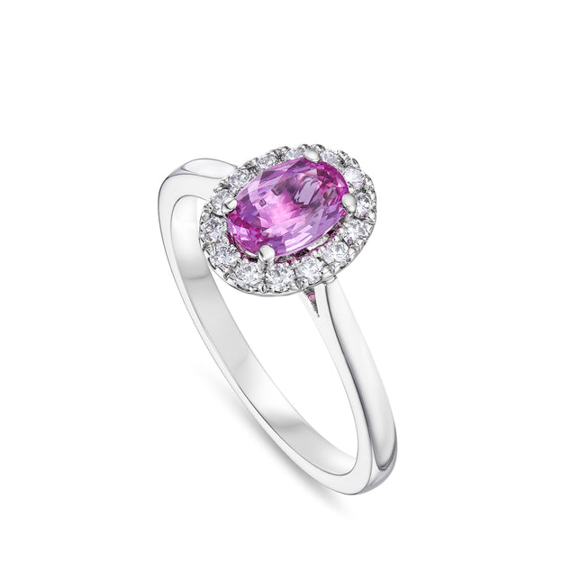 Oval Cut Pink Sapphire and Diamond Halo Ring in Platinum
