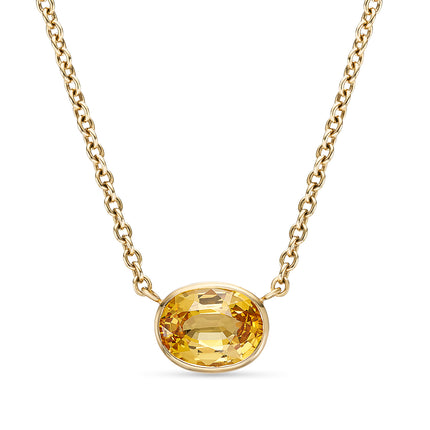 Oval Cut Yellow Sapphire Pendant in Yellow Gold