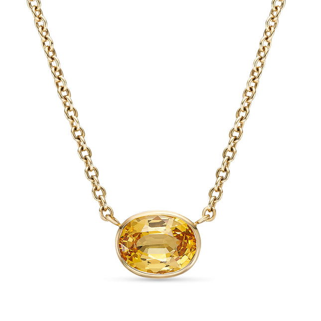 Oval Cut Yellow Sapphire Pendant in Yellow Gold