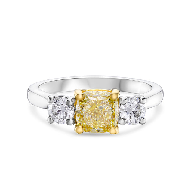Cushion Cut Yellow Diamond Trilogy Ring in Yellow Gold and Platinum