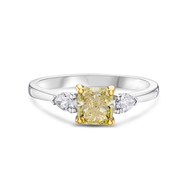 Cushion Cut Yellow Diamond Trilogy Ring in Yellow Gold and Platinum