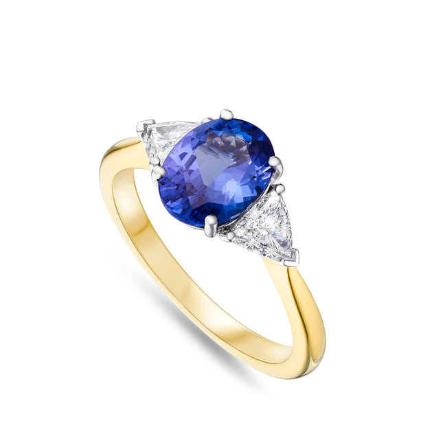 Oval Tanzanite and Diamond Trilogy Ring in Yellow and White Gold