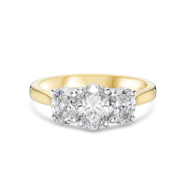Oval Cut Diamond Trilogy Ring in Yellow Gold and Platinum