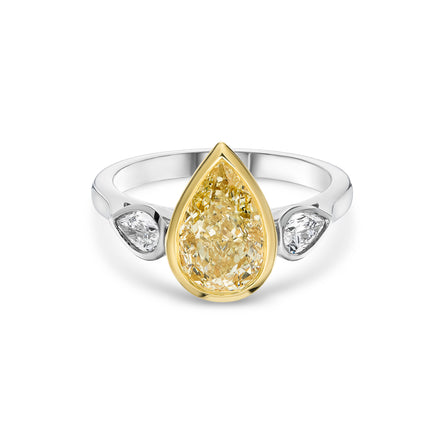 Pear Shape Yellow Diamond Trilogy Ring In Platinum and Yellow Gold