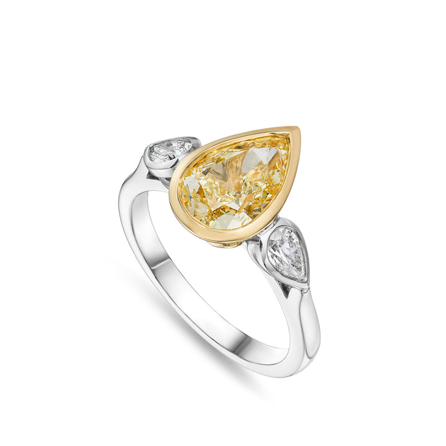 Pear Shape Yellow Diamond Trilogy Ring In Platinum and Yellow Gold