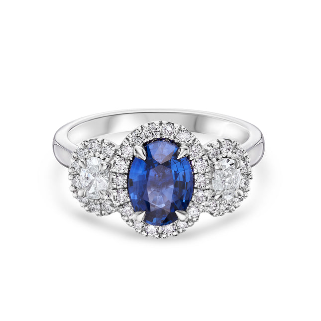 Oval Sapphire and Diamond Trilogy Halo Ring in Platinum