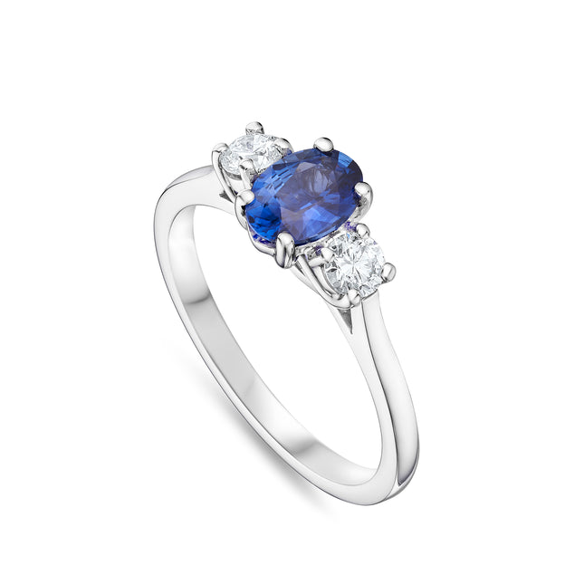 Oval Sapphire and Diamond Trilogy Ring in Platinum