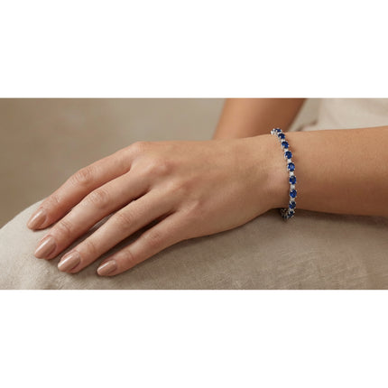 Oval Cut Sapphire and Diamond Tennis Bracelet in White Gold